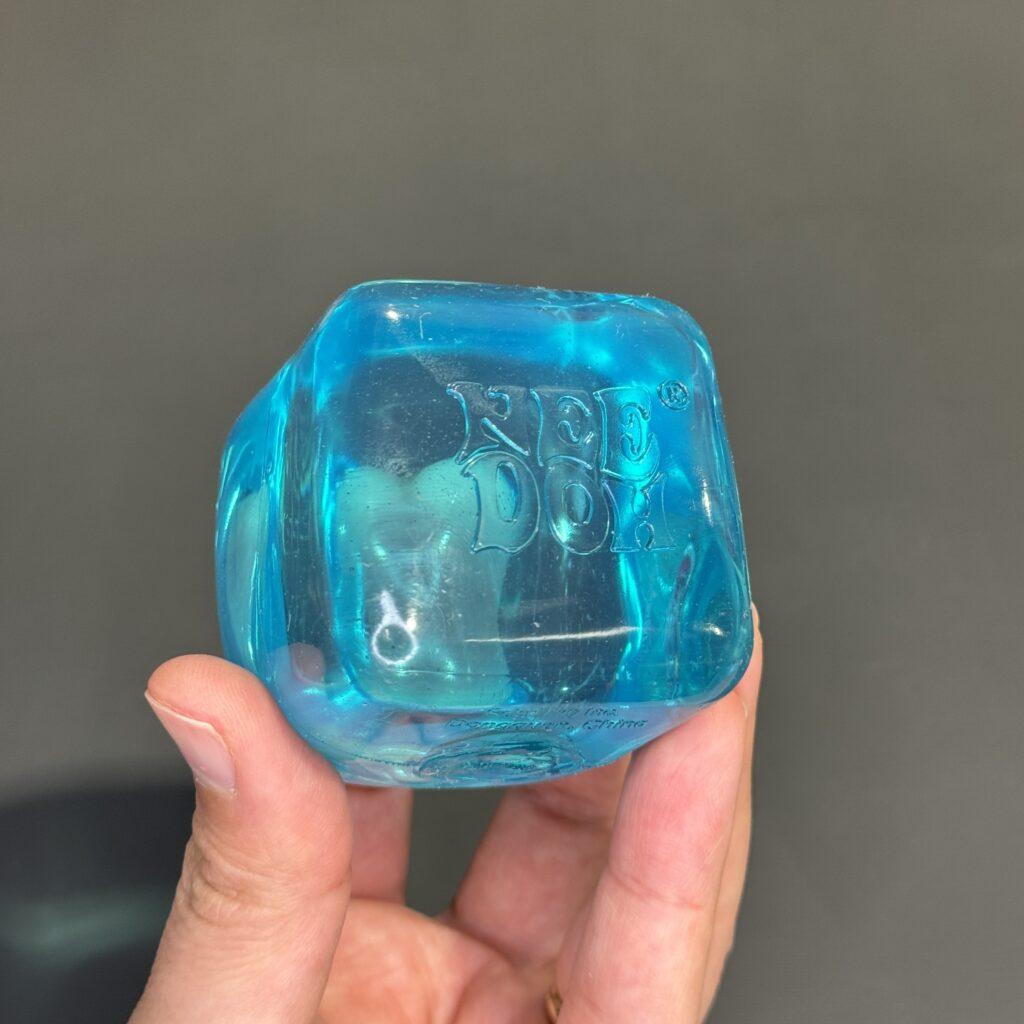 NeeDoh Nice Cube blue translucent squishy stress ball